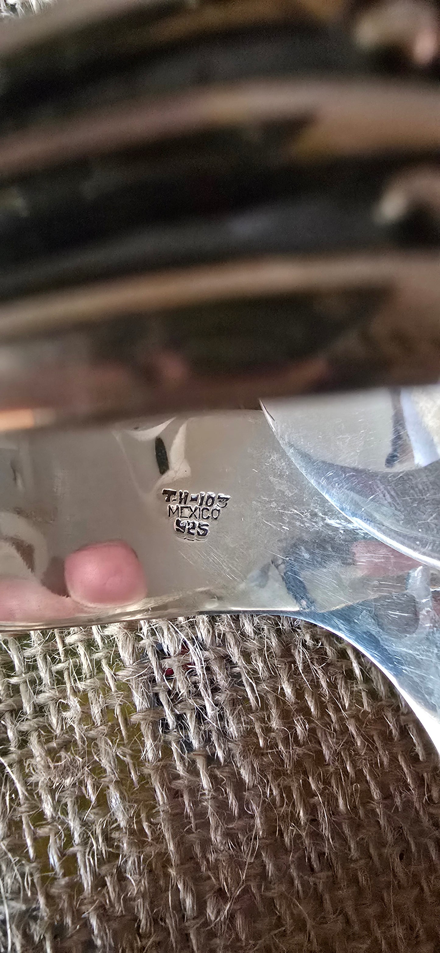 back marking of the vintage taxo sterling silver cuff
