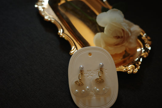 handmade evil eye charm earring