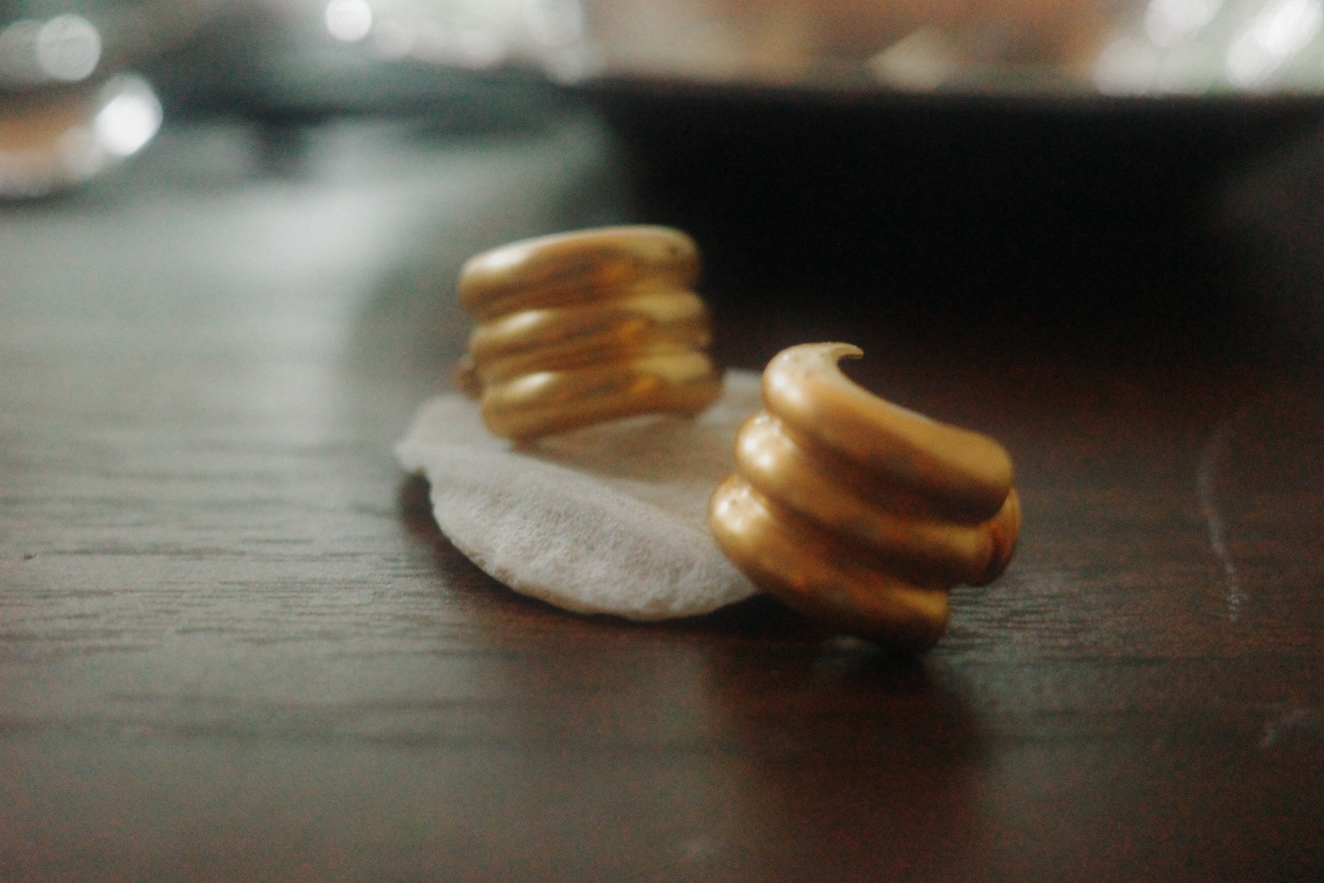 Vintage Monet Clip-On Earrings – Sculptural Gold Swirl Design