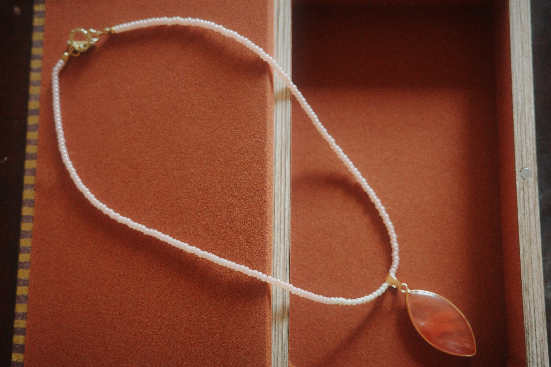 pink seed bead necklace with cherry quartz pendant