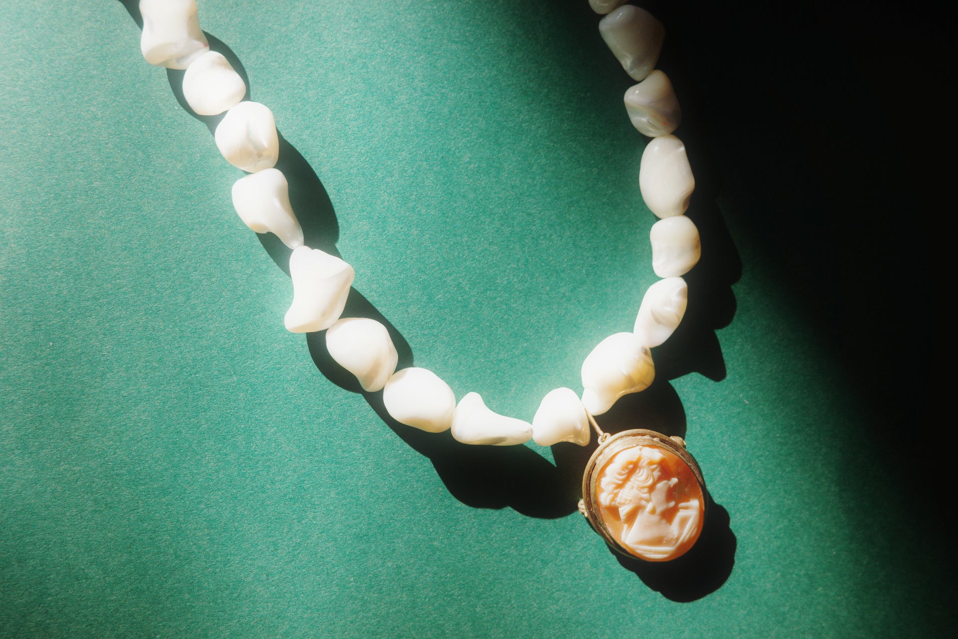 handmade necklace with pearl beads and vintage cameo pendant