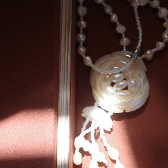 video of vintage pearl necklace